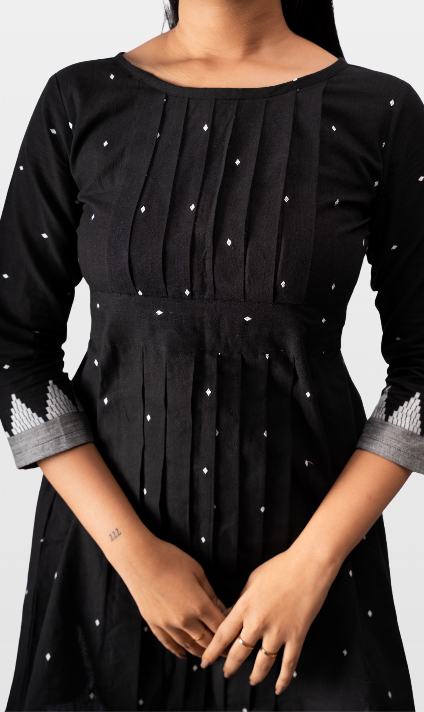 House of Leela Indian Handloom VIHA Jacquard Dress Black and silver pleated with silver buti, round crew neck and border waist banded knots with back zip closure and pockets dress pure cotton
